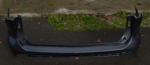 USED AFTERMARKET REF#U0397 || 2020-2025 TOYOTA HIGHLANDER || REAR BUMPER COVER ONLY