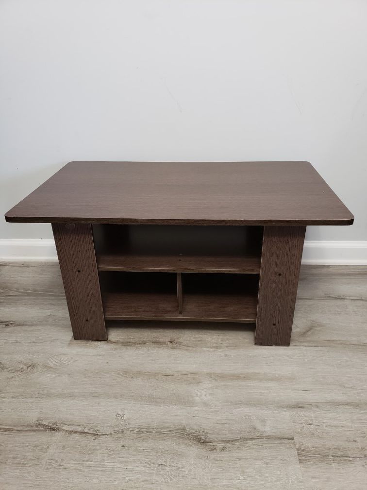 Coffee table with organizing shelves