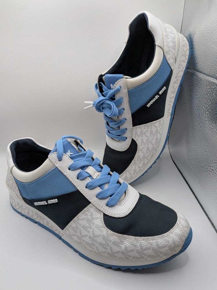 NEW Michael Kors Allie wrap trainer sneaker in a two tone blue and white Signature print canvas with a rubber sole.