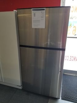 New scratch and dent GE 21cu.ft top mount fridge stainless steel 1 year warranty