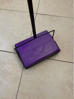 Purple cordless vacuum for rug