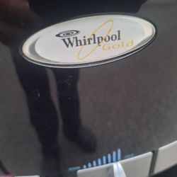 STAINLESS STEEL WHIRLPOOL GOLD TOP- LOAD WATER DISPENSER. 