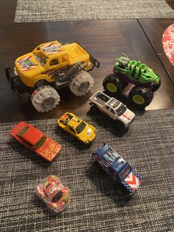 Lot of 7 cars and monster trucks