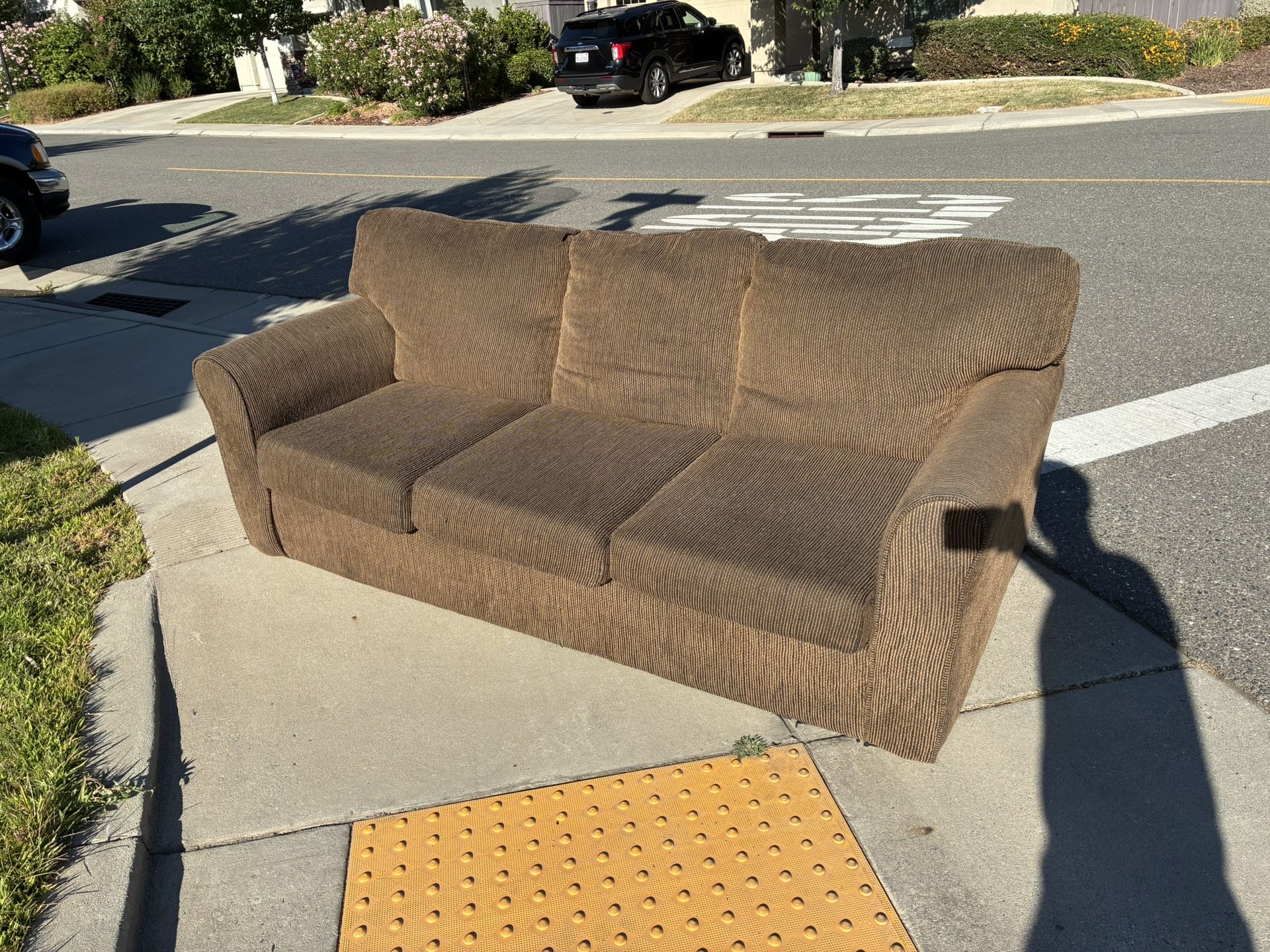 Comfortable brown fabric couch