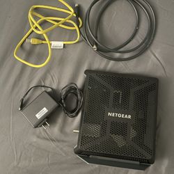 100$ OBO Netgear WiFi Router- modem combo 