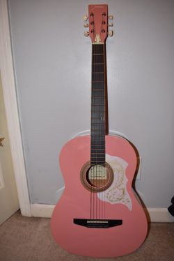 Pink children's guitar Brand new.