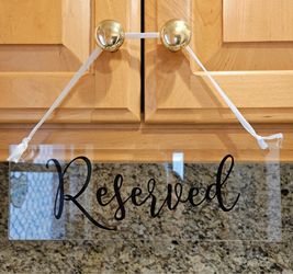 “Reserved” Signs