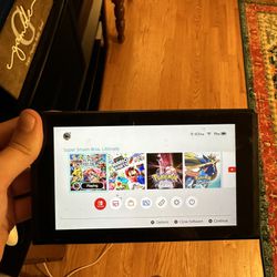 Nintendo Switch + Controller + Games