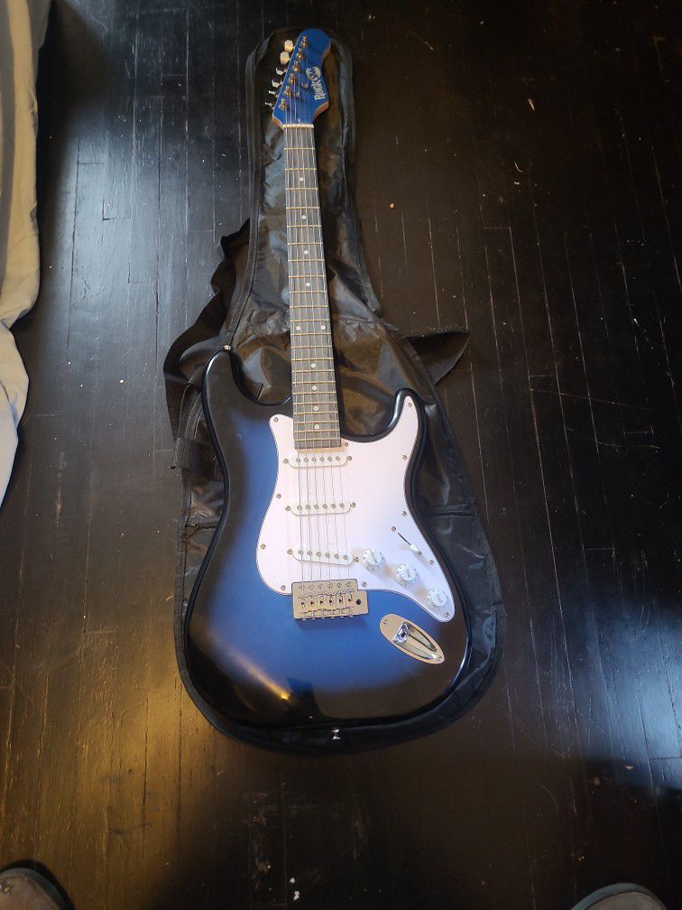 Rock Jam Stratocaster Electric Guitar And Amplifier 