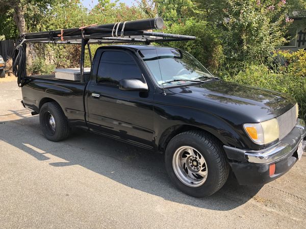 2000 Toyota Tacoma, 5 speed manual transmission, 216k miles, 4 cyl for