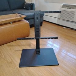 SANUS Universal TV Stand - Large Swivel Base Replacement TV Stand for Screens Up to 86" - Swivels 70 Degrees & Height Adjusts 8"