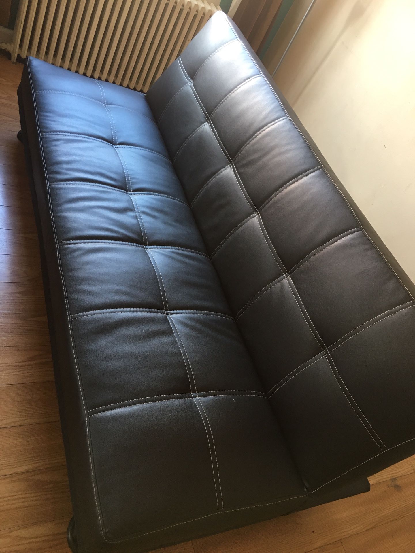 Beautiful leather futon /full size bed