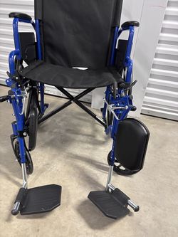 Blue and black Drive wheelchair