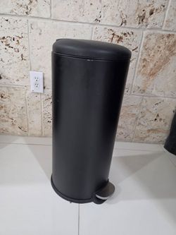 Black trash can