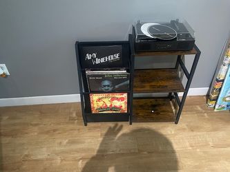 Record player ,stand and vinyl $40