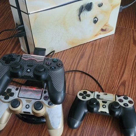 PS4 64GB, 3 Remotes, Charging Dock, And 15 Games