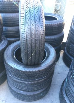 225/65/17 BRIDGESTONE Semi new set 95% LIFE $200 INCLUDING PROFESSIONAL INSTALLATION AND TAX