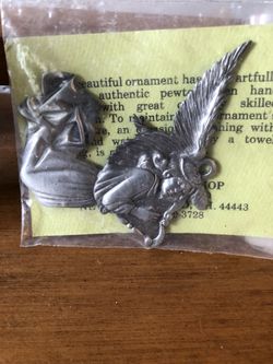 Beautiful pewter angel playing a harp hanging ornament