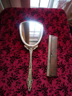 Vintage vanity set mirror and comb. made in the u.s.a.