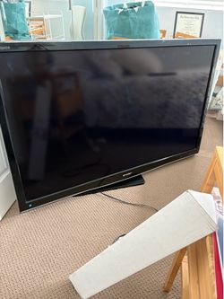 Large 52” Sharp Aquos TV and Stand