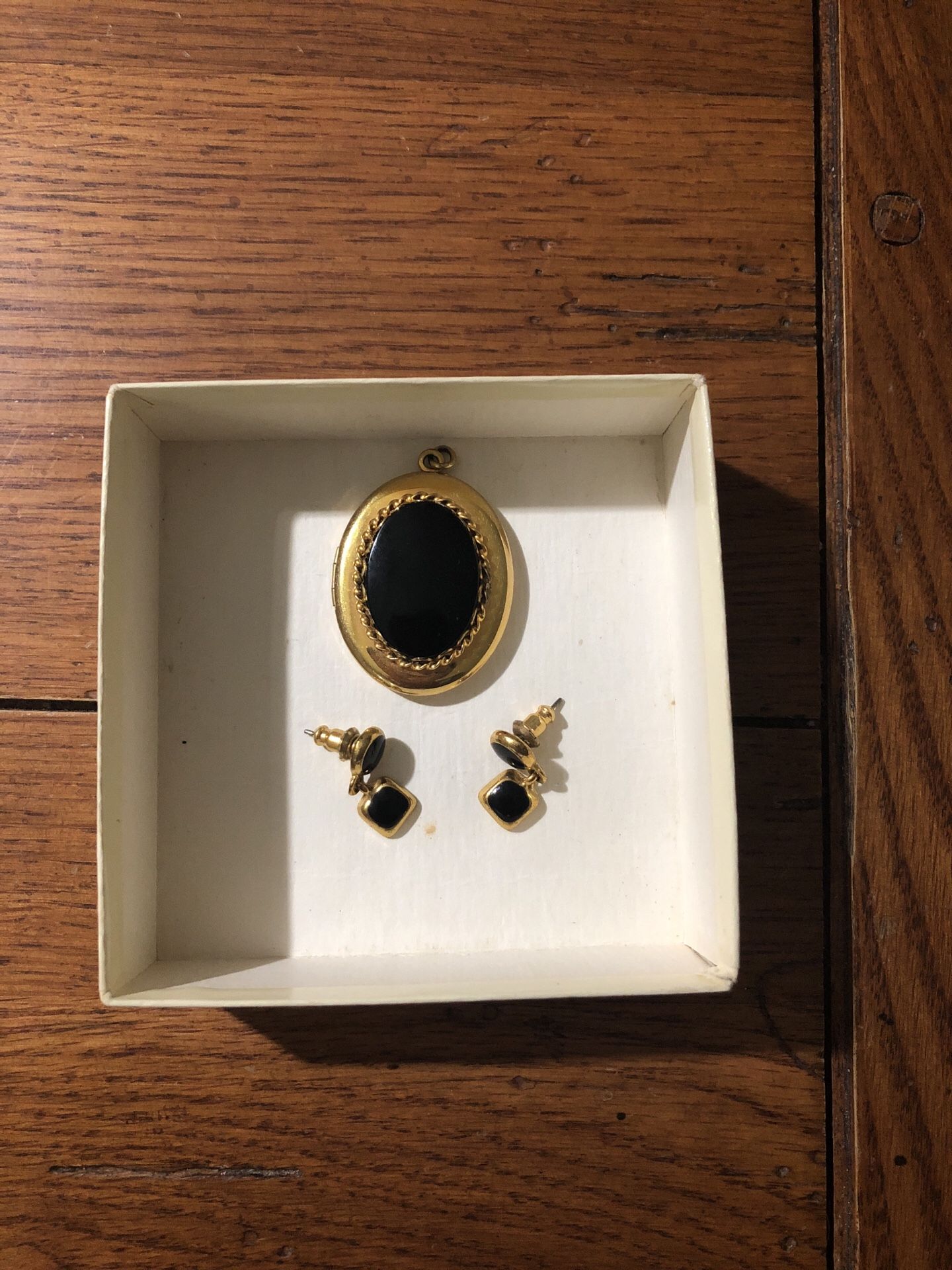 Black onyx locket and earrings.