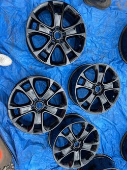 Ford OEM  18 inch wheels gloss black  18 inch 5x114 +52.5 fully refinished like new ! 750$ for 4 rims plus tax.  New and used tires options available 