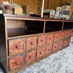 It has some light scratches on the top from use. (L65”w19.5”H26.5”)