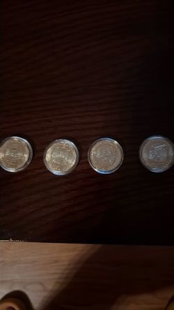 Set of 4 Collectible Coins in Capsules