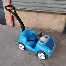 Step 2 push along with seat belt cup holder and handle