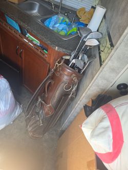 Vintage golf bag and golf clubs