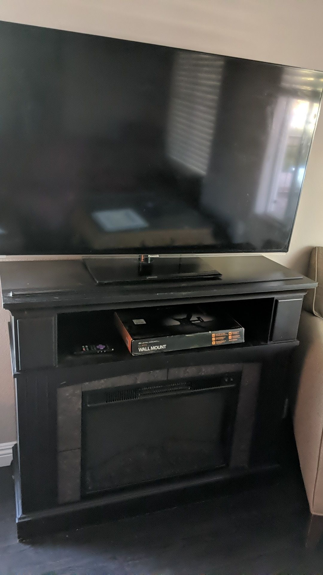 50" 1080p smart t.v., wall mount, and fireplace