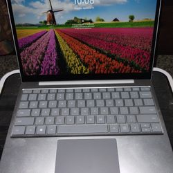 Surface Laptop Go, with Windows 11, $250 obo