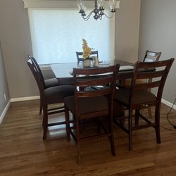 High Extendable Dinning Table With Six Chairs