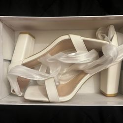Woman’s White Chunky Heel