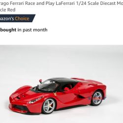 Ferrari 1:24 die cast race and play car, new: 