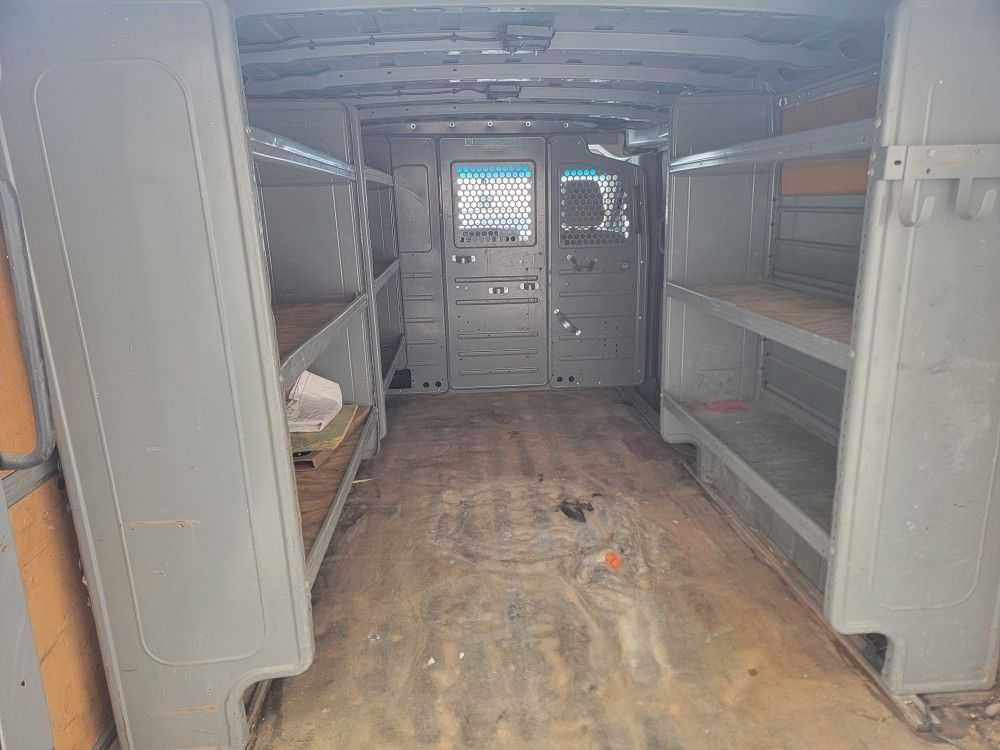 Cargo van shelving and partition (used on Nissan NV)