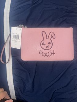 Coach Pink Wristlet with Bunny Motif