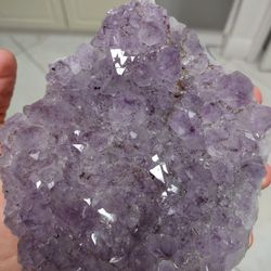 Amethyst Crystal Cluster Display Specimen.   Smooth, Polished sides with the back and front left natural;5" H x 4.5" W x 2" D; Weight 2.326 Lb.