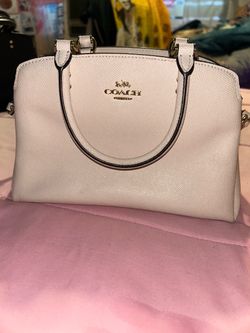 White/cream coach purse