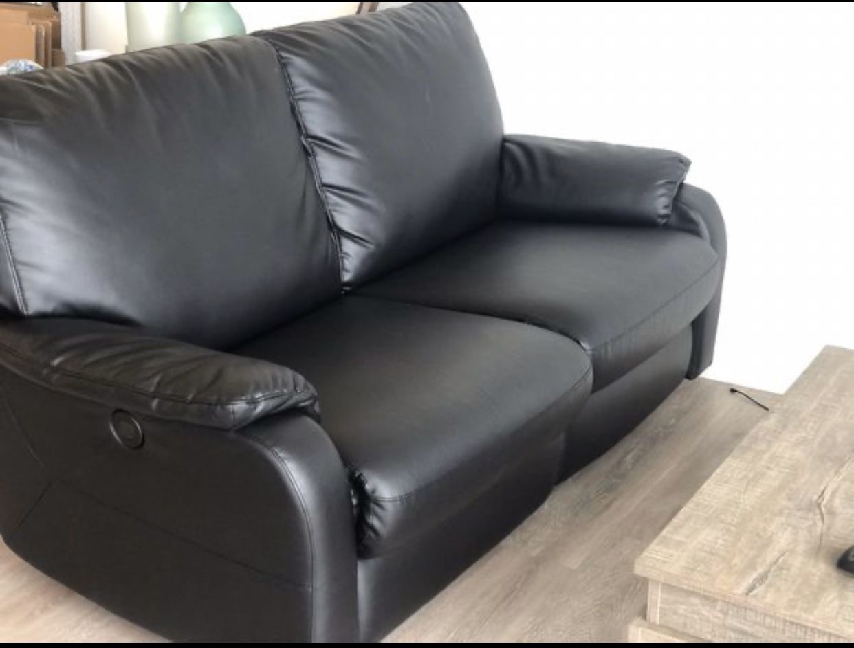Black IKEA TOMBACK Sofa with Adjustable Electronic Recliner