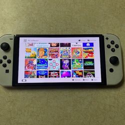 NINTENDO SWITCH OLED with 7500 GAMES INCLUDED