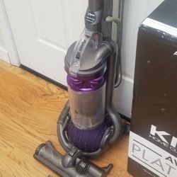 NEW cond DYSON ANIMAL VACUUM WITH COMPLETE ATTACHMENTS. , WORKS EXCELLENT. , AMAZING POWER SUCTION 
