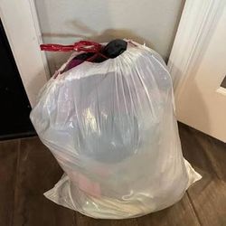 Lady’s Bag Of Clothes 