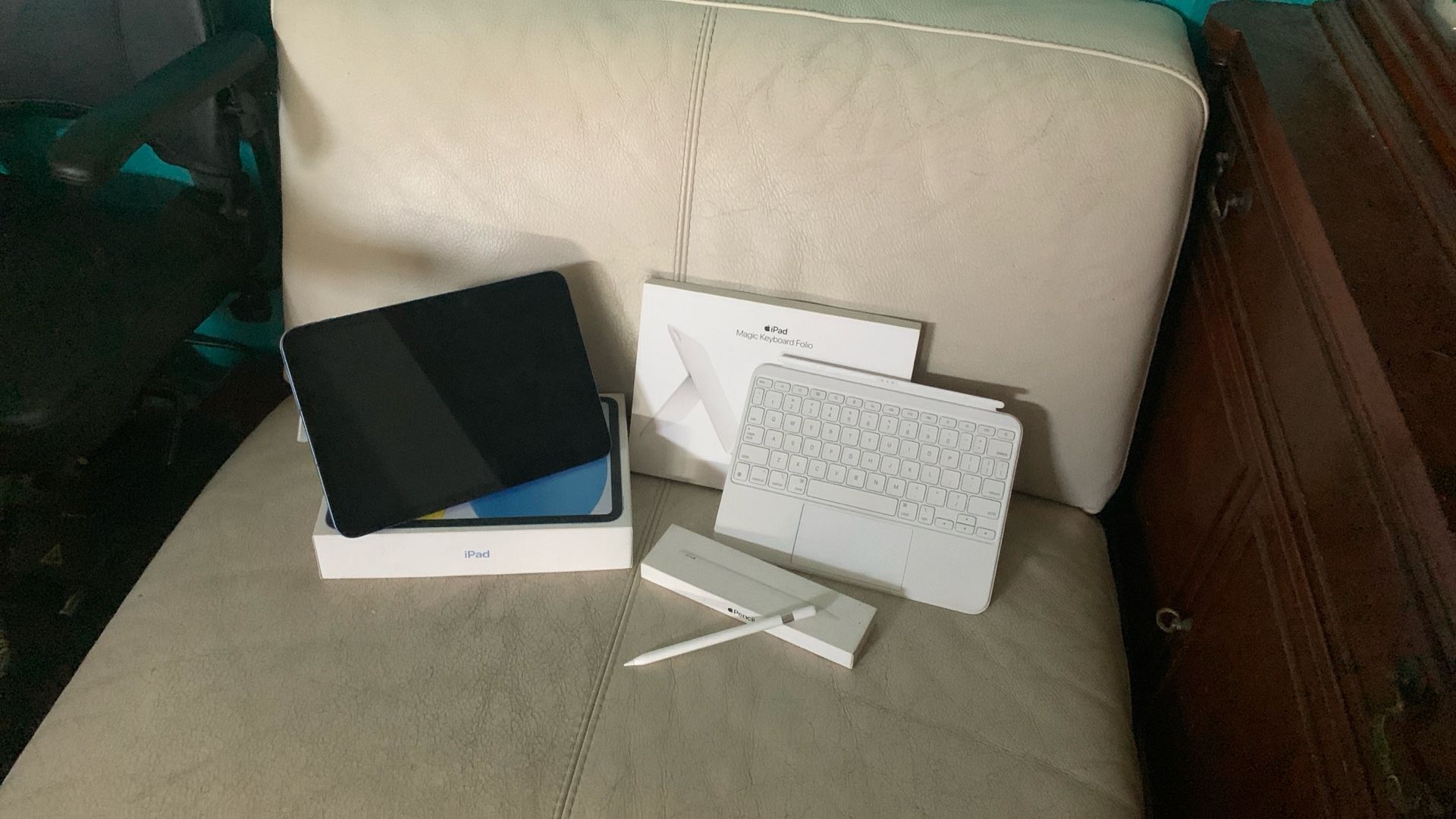 Apple iPad 10th Gen, Apple Pencil 2nd Edition, And Apple Magic Keyboard Folio.
