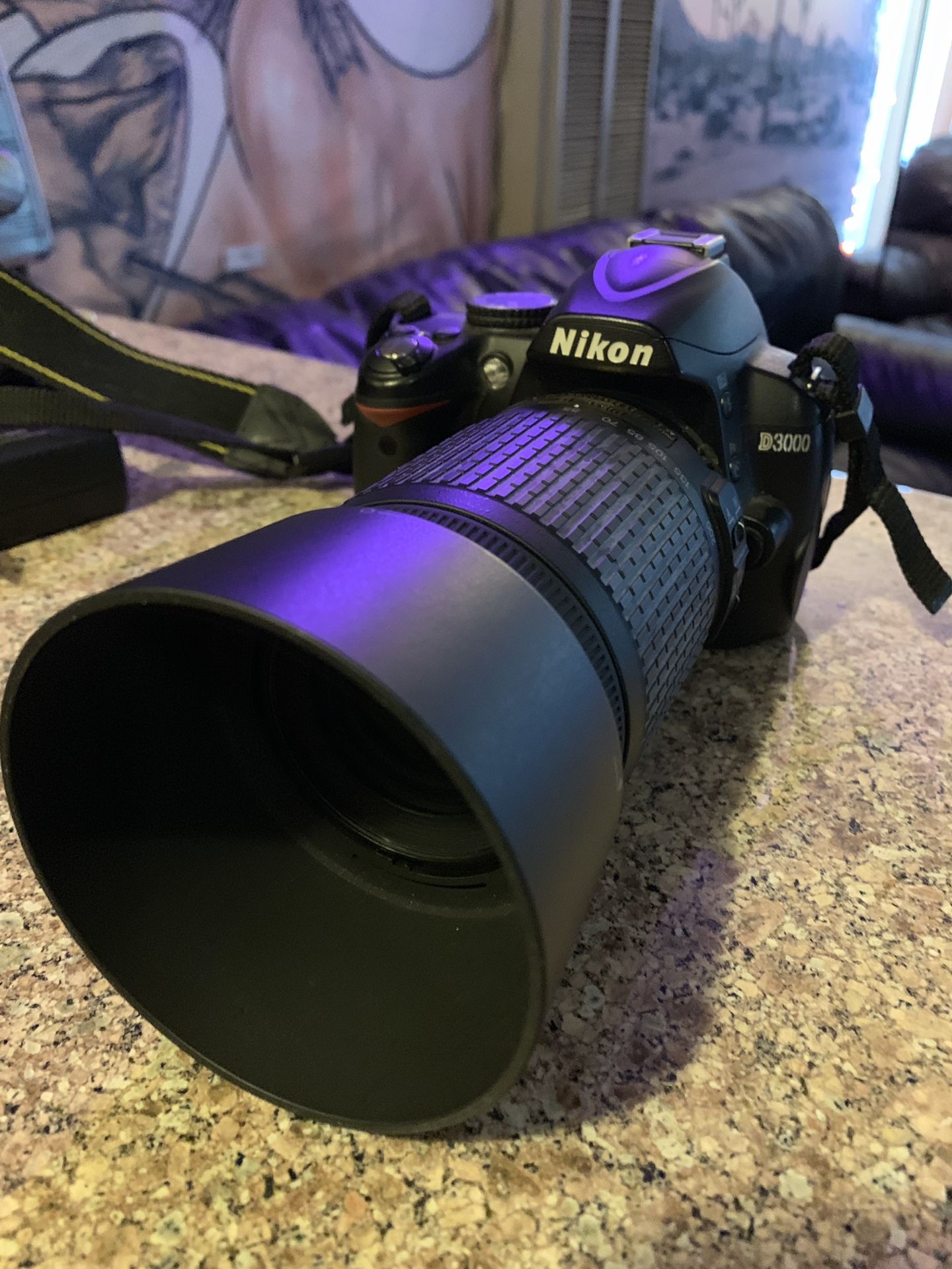 Nikon d3000 with two lenses and two chargers