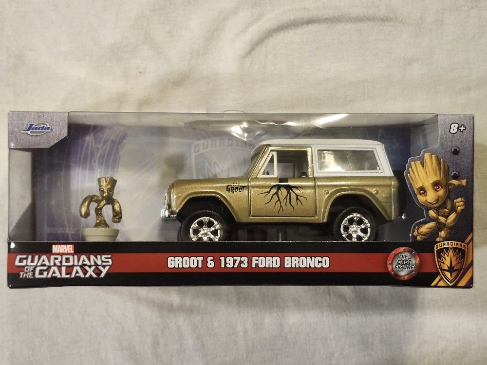 JADA METAL DIECAST CAR 1:32 SCALE. MARVEL GUARDIANS OF THE GALAXY GROOT. 1973 FORD BRONCO AND GROOT METAL DIECAST FIGURE.