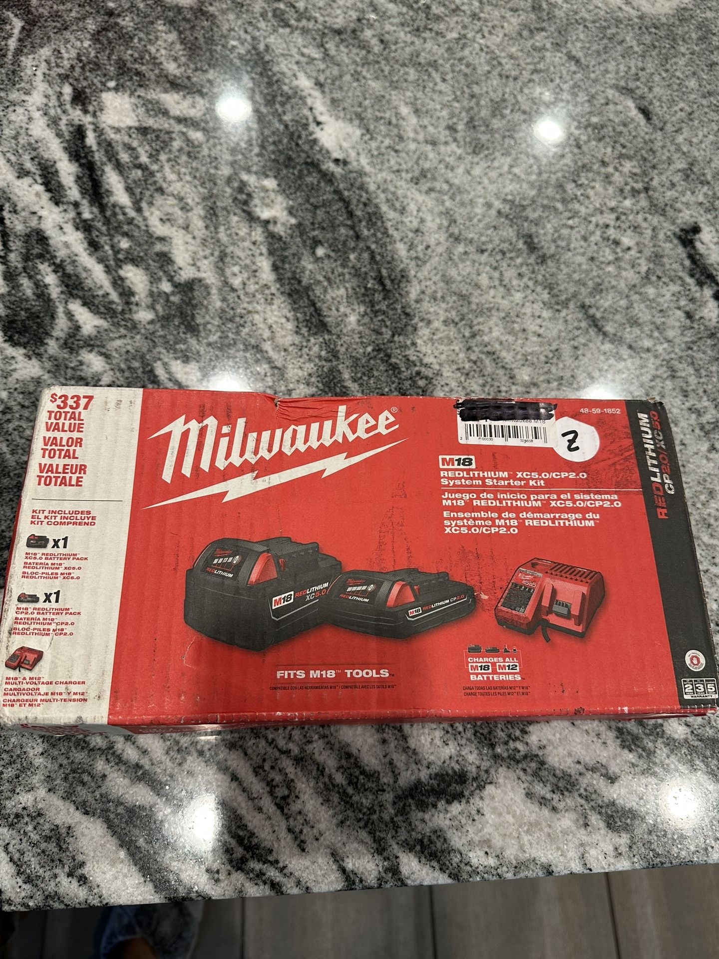 M18/M12 charger and batteries kit. 