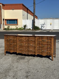 French Provincial Style 9-Drawer Triple Dresser with Carved Panels & Brass Hardware