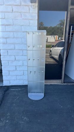 Spinner pegboard pop display. Translucent with 23 hooks - 16” x 60”
