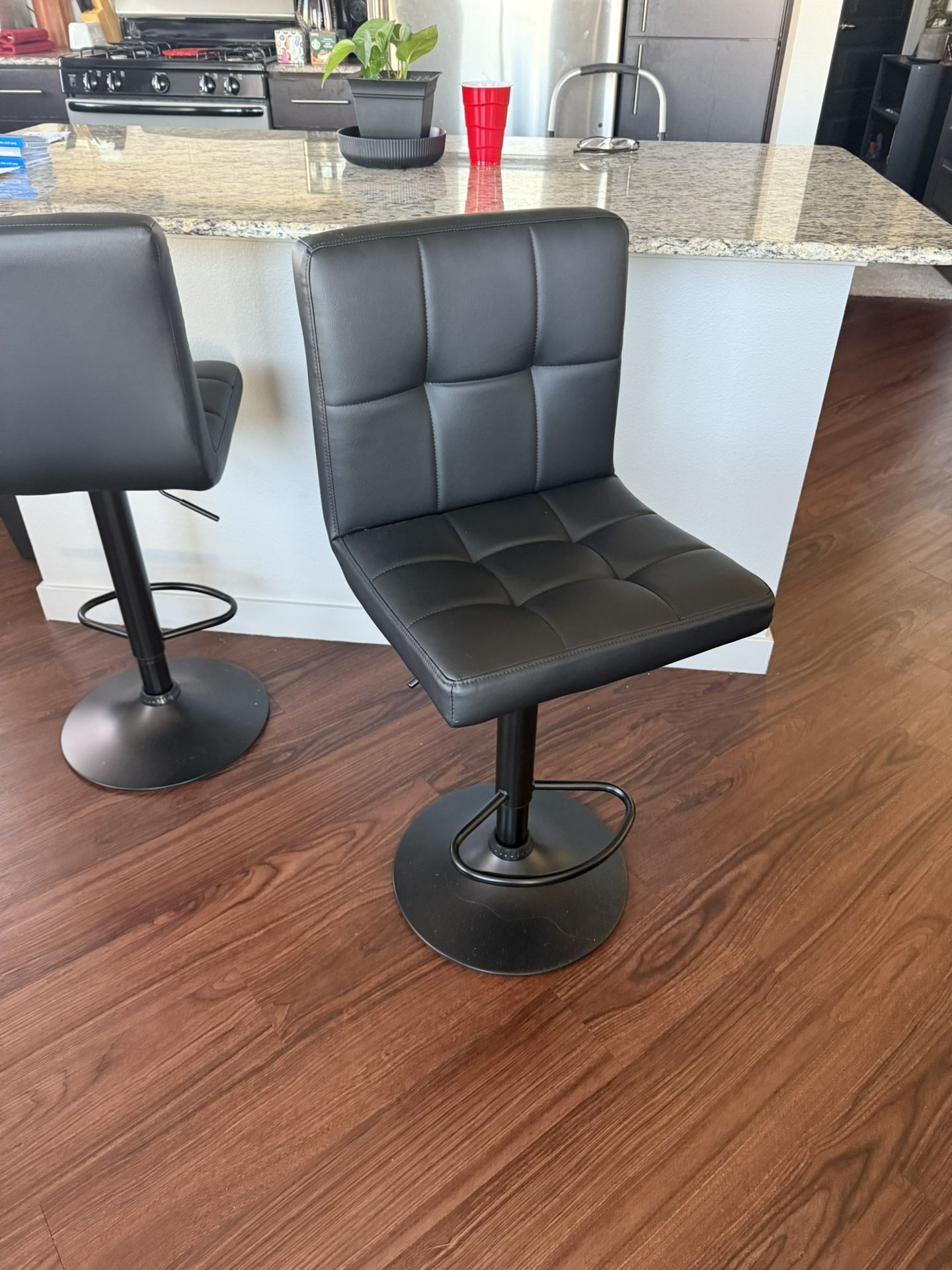 2 Adjustable/swivel Black Bar Stools
